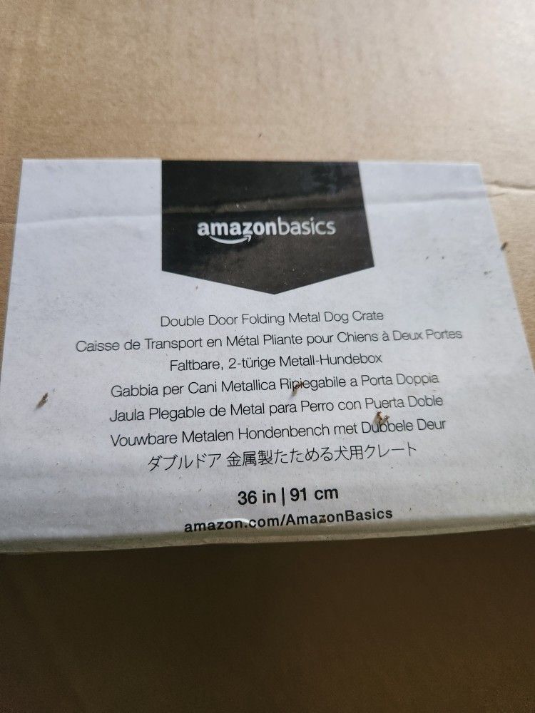 AmazonBasics 36 inch Double Door Folding Metal Dog Crate Cage
