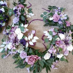 2 Artificial Flower Garland wreaths for table decor

Condition is used twice
$130 for longest wreath
$120 for shorter

Measurement of each arrangement