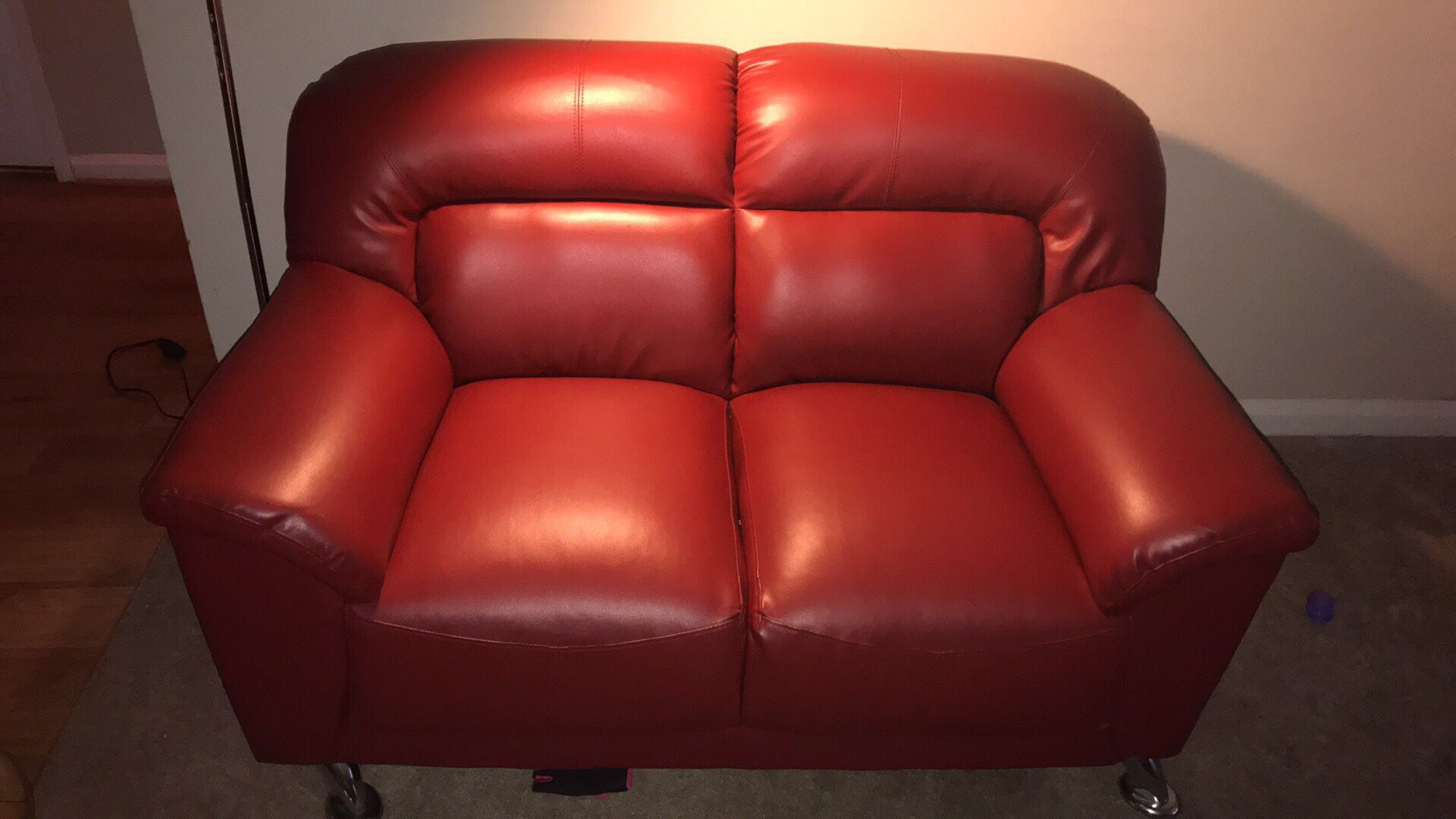 Red leather couch and love seat