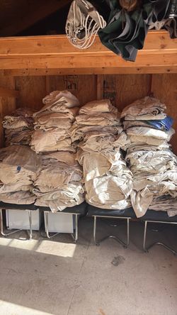 Canvas drop cloths all sizes even  sheets .. clean  on one side .. have separated into indoor and outdoor . One side dirty one side clean !!