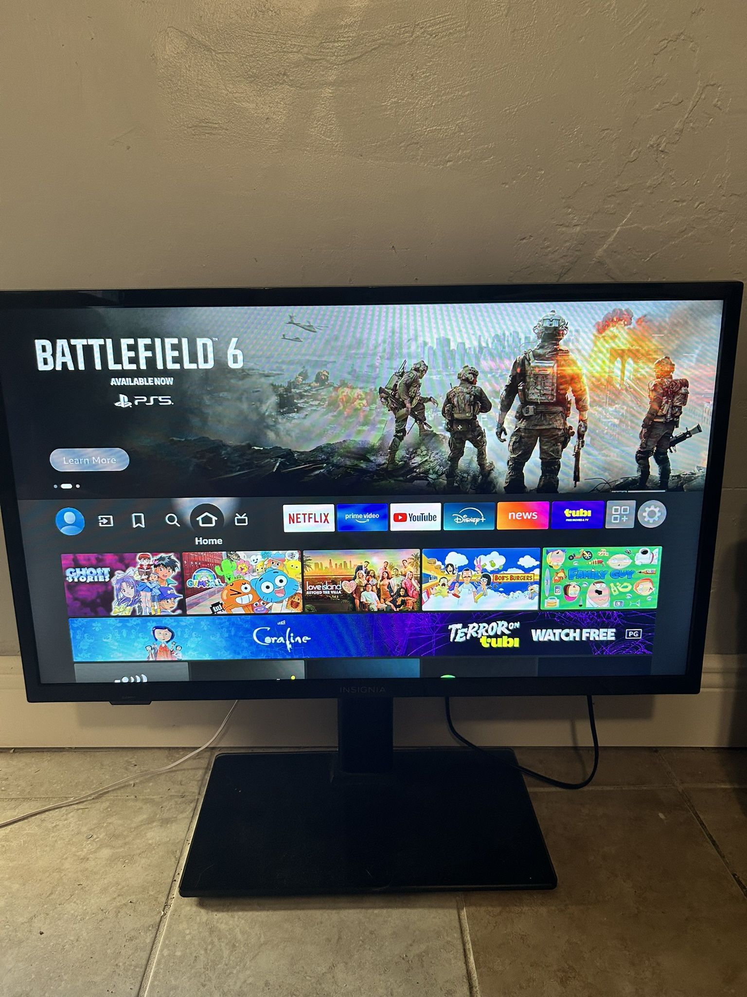 32 Inch Insignia TV with remote and TV stand