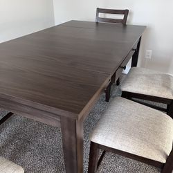 4seats Of Chair With One Bench Dining Table   It’s new,No scratches , no spots Only two month used. Moving out to other place it’s way too much big