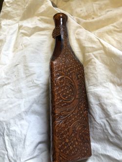 Hand tooled leather covered bottle