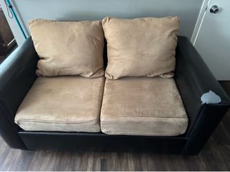 Free Love Seat. Must Pick Up. If post is up is still Available.