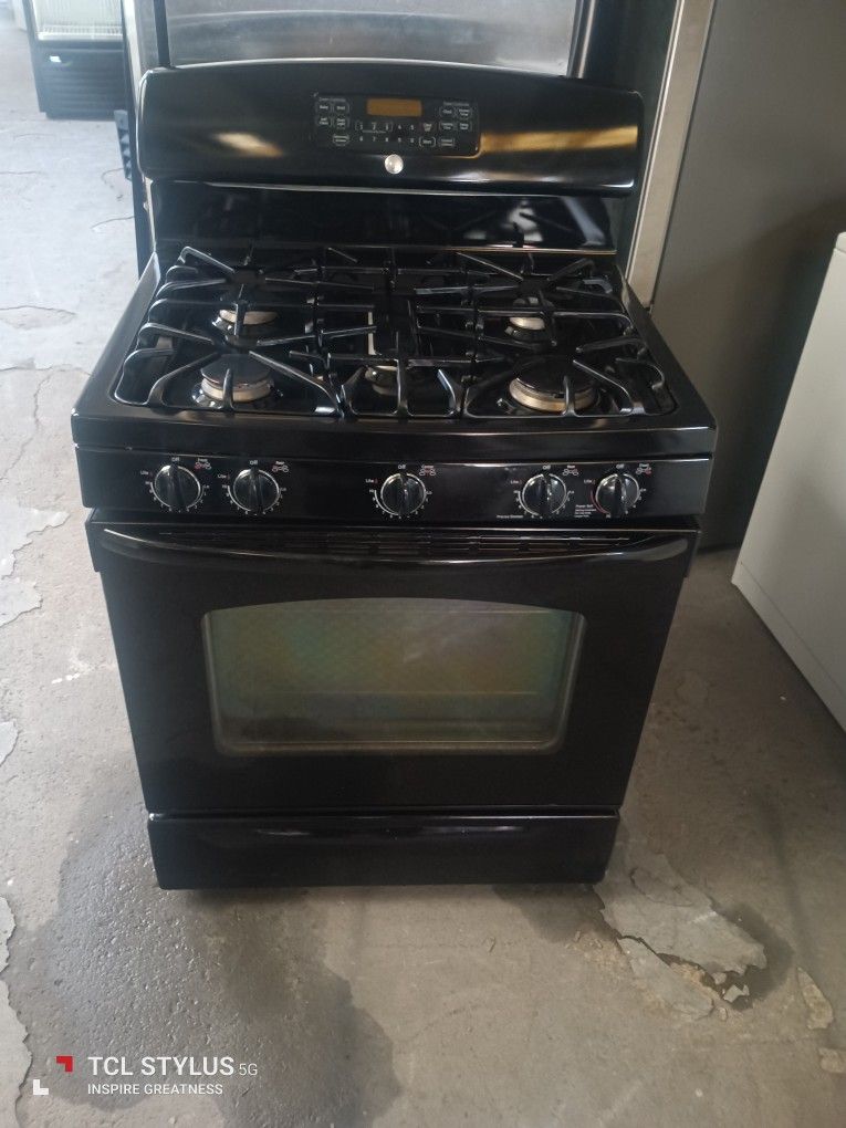 Stove Gas GE 5 Burners Everything Is And Good Working Condition 3 Months Warranty Delivery And Install