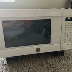 GE Profile countertop microwave oven.