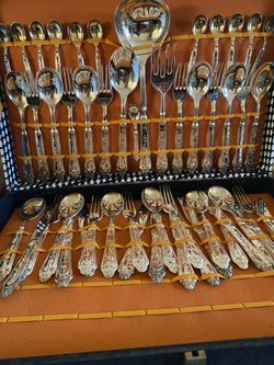 Brand new set of stain steel utensils Box Is A Bit Damage