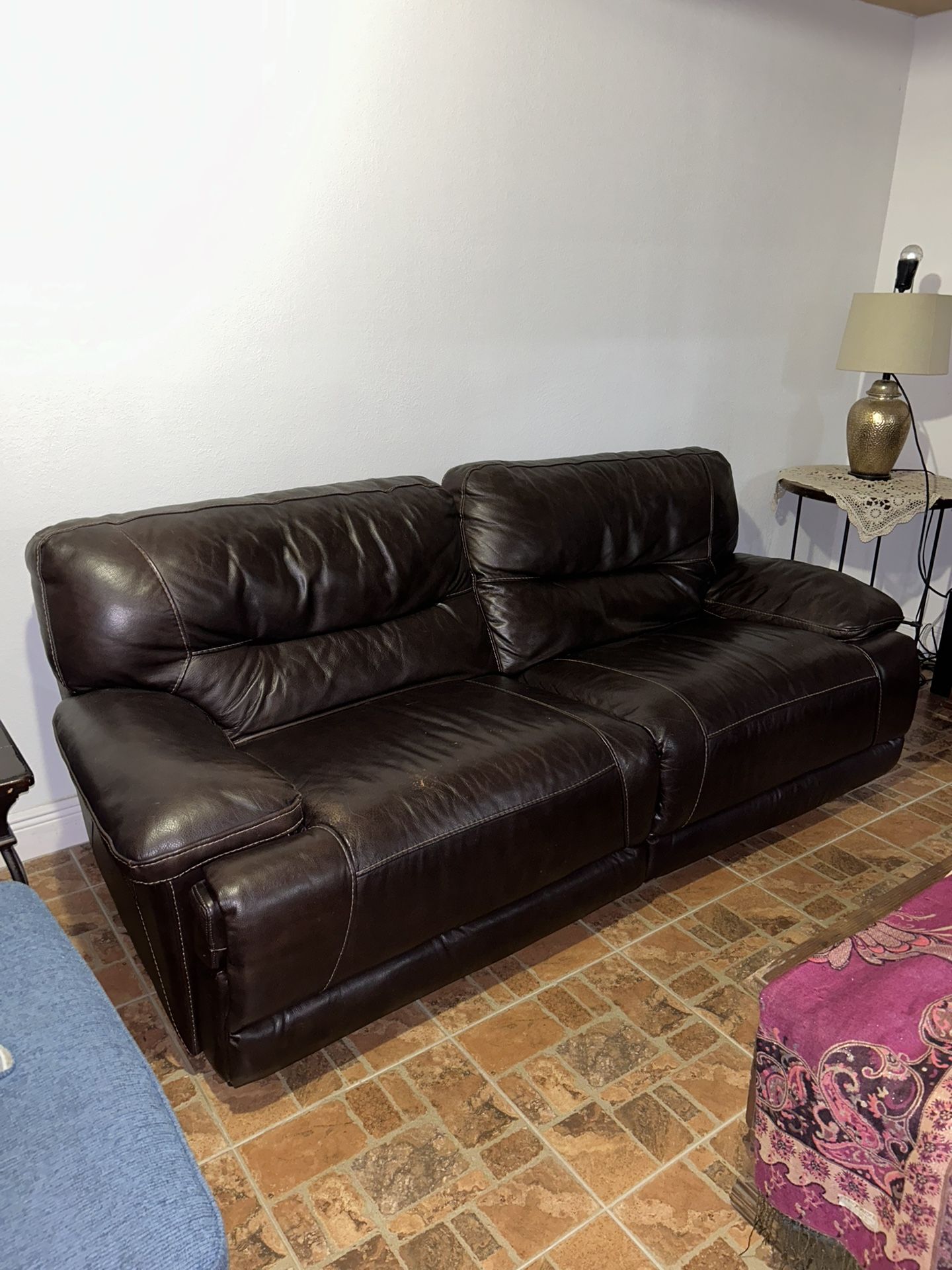 BROWN LEATHER RECLINING COUCH