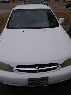 1998 Nissan Altima white very reliable clean inside and out title in hand