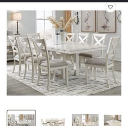 Ashley dinning table comes with 8 chairs