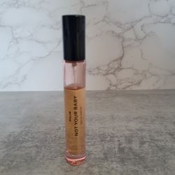 Phlur Not Your Baby Travel perfume spray, used