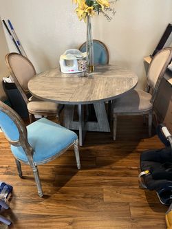 5-piece dining set (round/oval table + 4 upholstered chairs)