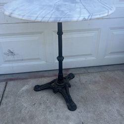 marble table with metal. is. Heavy 