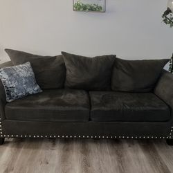 Sofa w/ Studs $350