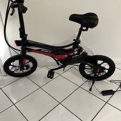 Swagtron EB7 Electric Bike With 2 Xtra Batteries, 2 Spare Inter Tubes, 2 16 Inch Spare Tires And A Helmet  Included 