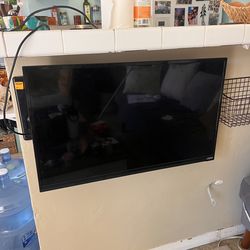 32” TV with wall bracket