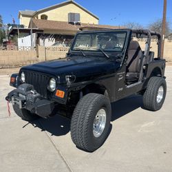 Tj