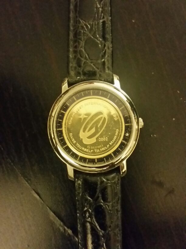 Goldquest international watch 2002 reward gold coin 10 gram 24 karat.