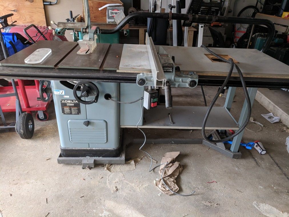 5 HP Delta Unisaw with Heavy Duty base, Long Extension Router Table and