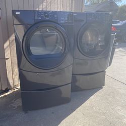 Black Kenmore front load washer and Gas Dryer set can deliver 