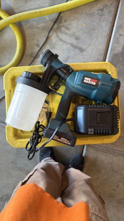 Battery powered paint sprayer