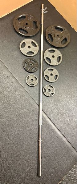Standard Steel 6 ft Brand New Bar with pair of Cast Iron Plates of 25#, 10# , 5# and 2.5 pounders. Brute Weight: 105#