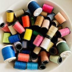 40+ spools 🧵 of thread, vibrant & traditional colors