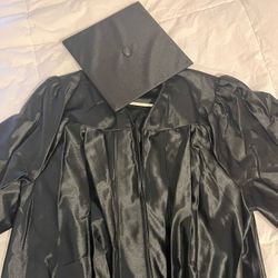 Black Cap And Graduation Gown 