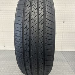 One likenew Bridgestone tire 235/60/18 # 1037