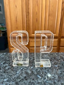 Vintage Acrylic S and P Pair of Salt and Pepper Shakers.  Size approximately 4 inches tall.  Preowned.  Has been on display in a cabinet with a very l