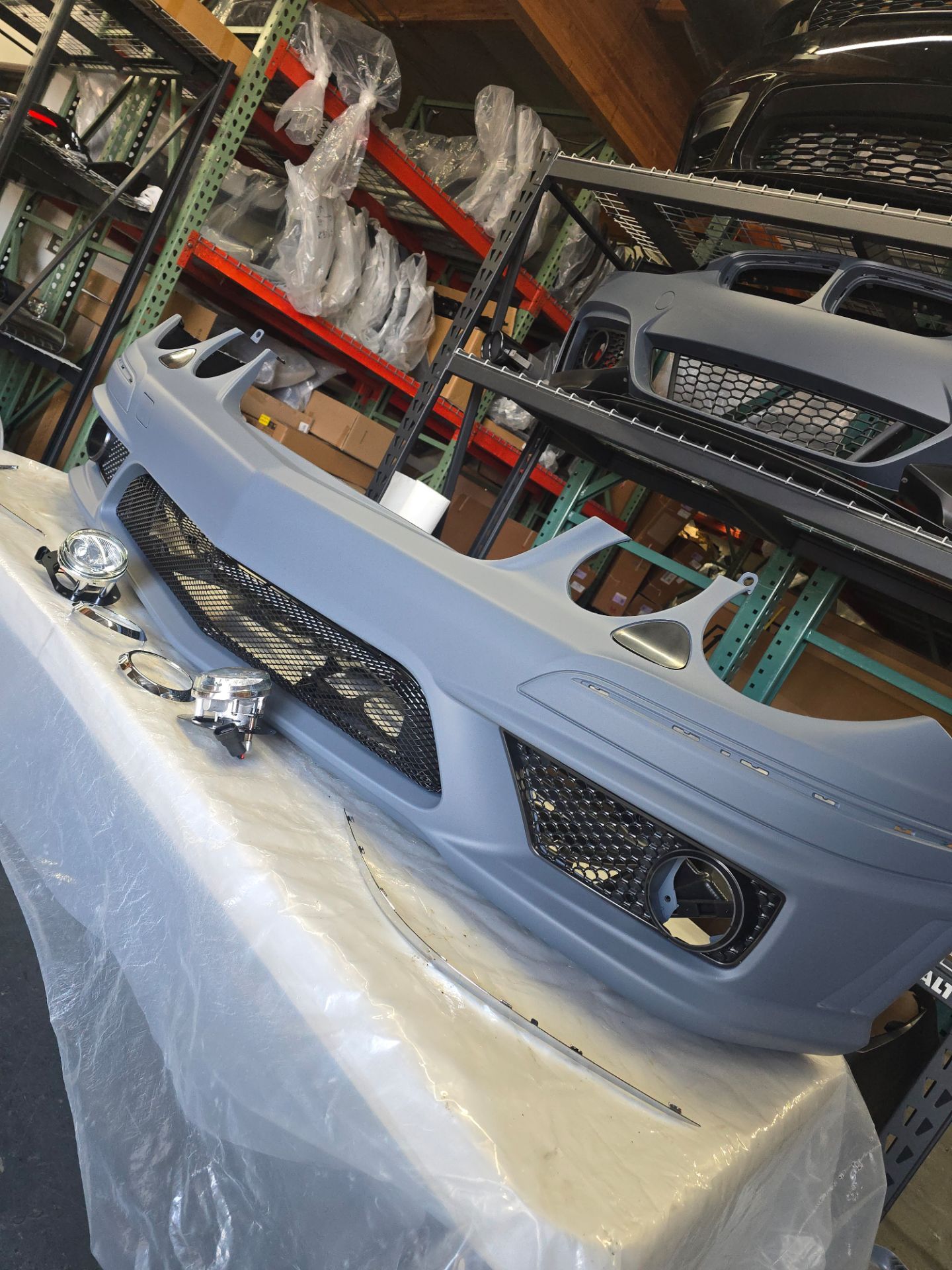 Mercedes Benz E Class W211 07-09 E63 Style Front Bumper w/o PDC w/ Fog Lamps