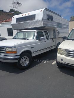 95 F250 2wd with Dolphin 700 slide in camper