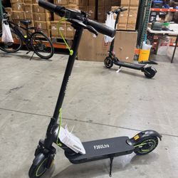 Front and rear shock-absorbing electric scooter