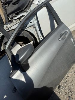 Versa note driver door