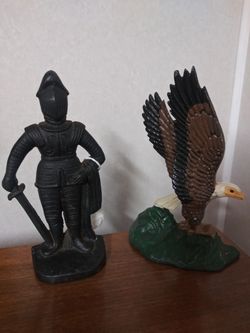 Two Vintage Cast Iron Doorstops