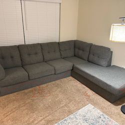 Grey L-Shaped Sectional Sofa – $350