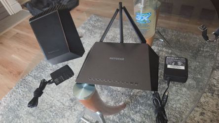 Netgear Nighthawk CM2000 Cable Modem + Nighthawk AC1900 Smart WiFi Router (R7000).