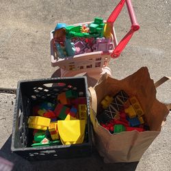 Assorted Plastic Legos And Clip Together Building Blocks