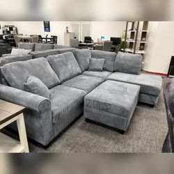Comfortable Dark Gray corduroy sectional couch with ottoman