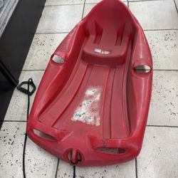 Red Plastic Snow Sled