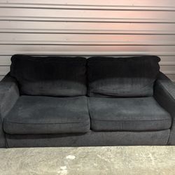 Dark Grey Fabric Sofa – Comfortable & Modern/ Can deliver to you for a bit more.