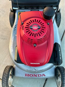 Lawnmower/ mower -Honda HRR 216 Smart drive. Rear wheel drive.  Starts right up and runs perfect.