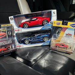 4 Dicast cars 2 large 2 small brand new
