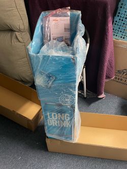 Impulse tower spring loaded dispenser