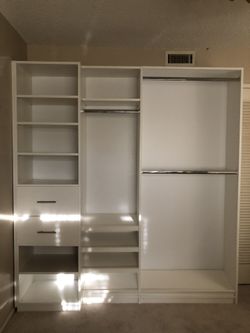 Closet system in white melamine 6’ W x 7’ H