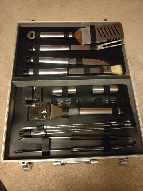 Brand new grill set in metal case