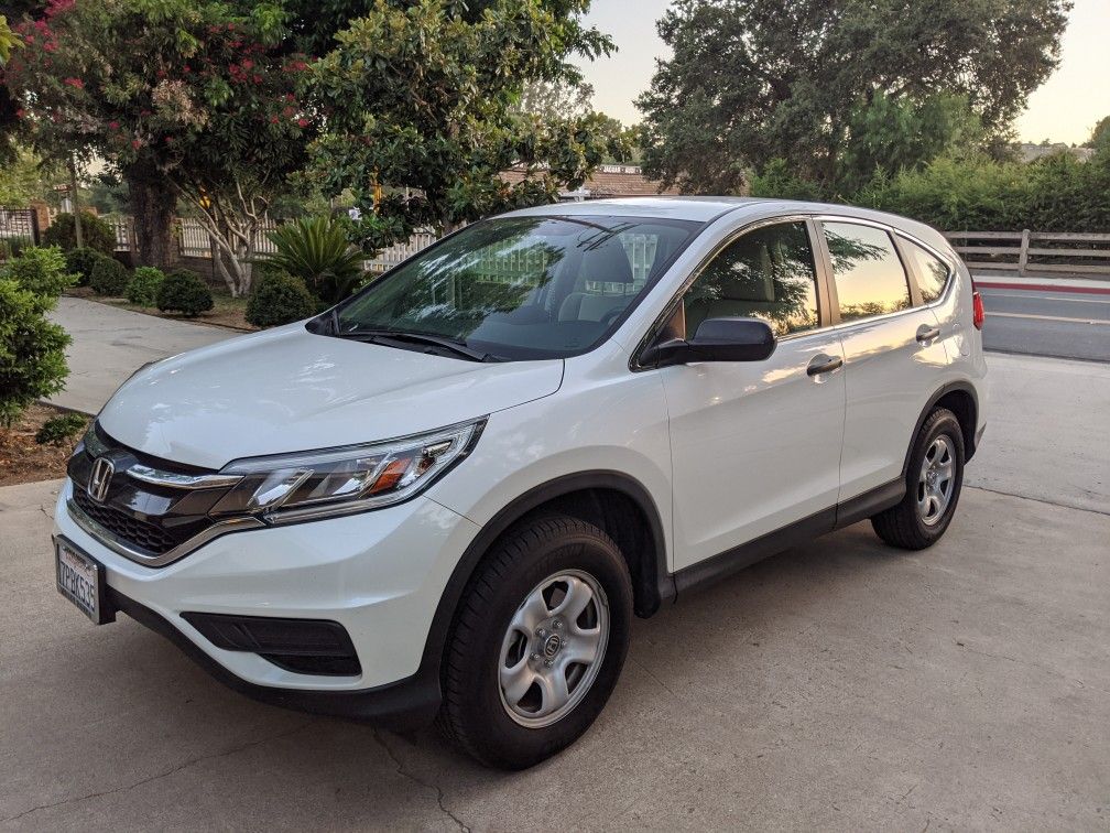 2015 Honda CRV one owner 13 k