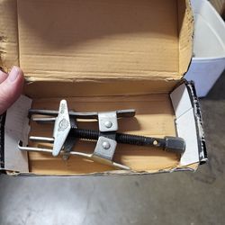 Overhead spring compressor