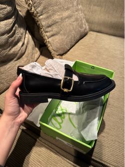 New black leather loafers
