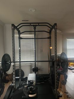 Squat rack and bench with cables